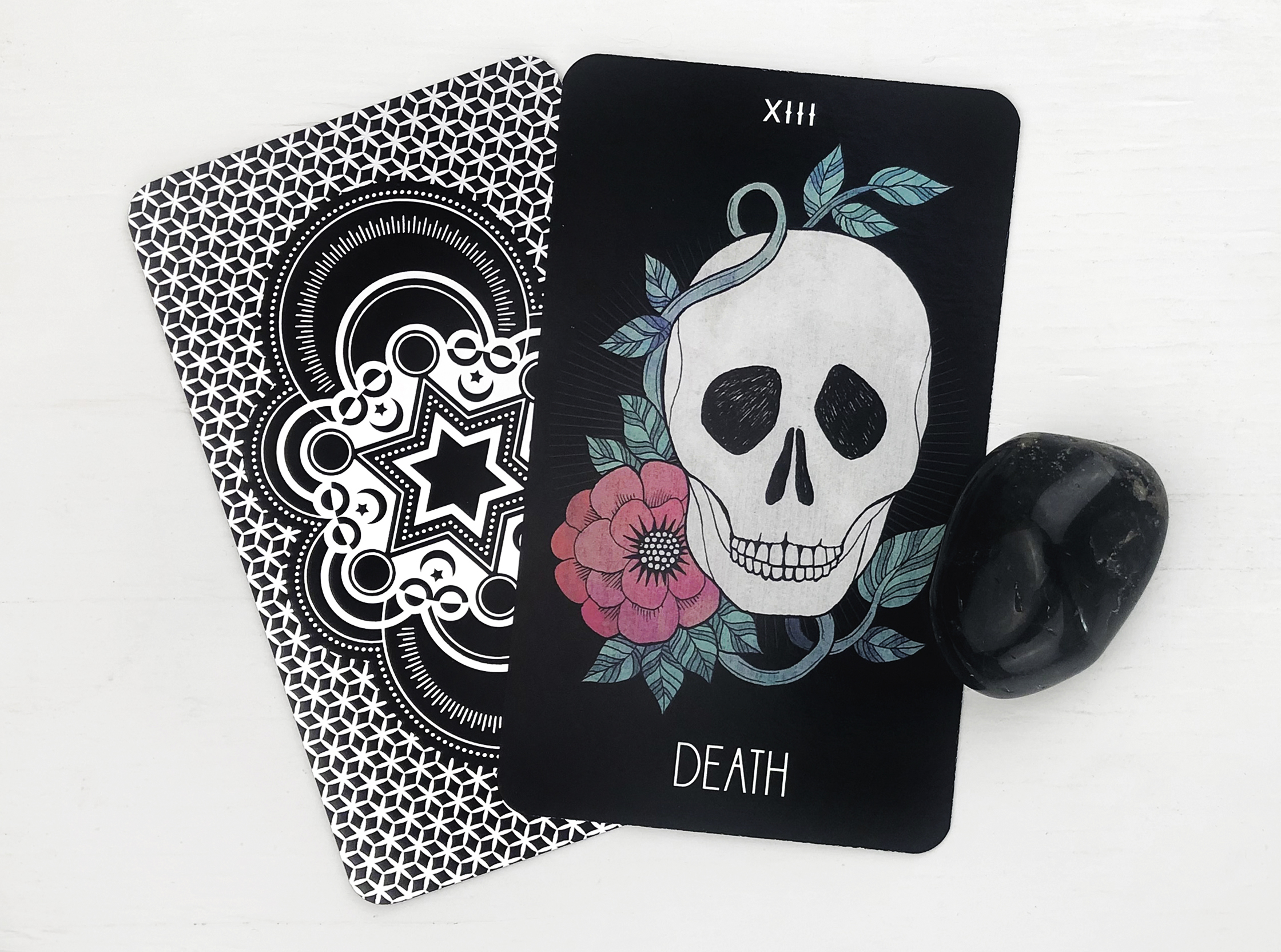 What the Death and Justice Tarot Cards Reveal About Major Life Transitions